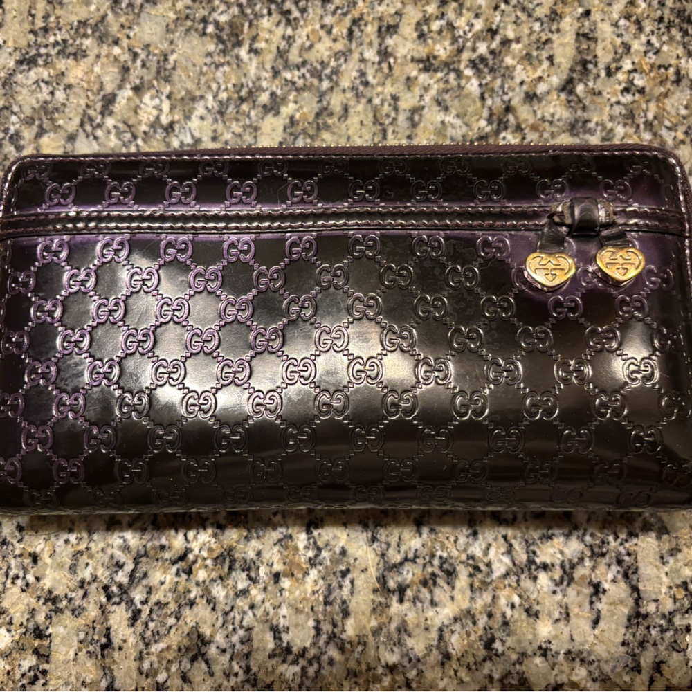 EUC Gucci black cherry patent leather zippy wallet